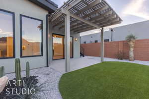 View of yard featuring a pergola and a patio area