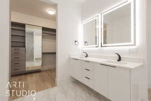 Bathroom featuring vanity and hardwood / wood-style flooring