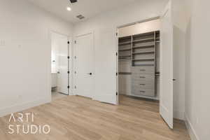 Unfurnished bedroom featuring light hardwood / wood-style flooring