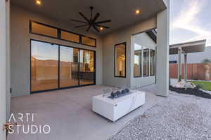 View of patio featuring ceiling fan