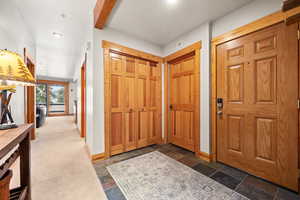 View of carpeted foyer entrance