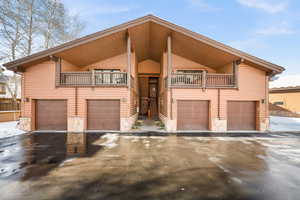 View of front of property featuring a balcony