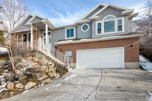 View of front of property with a garage