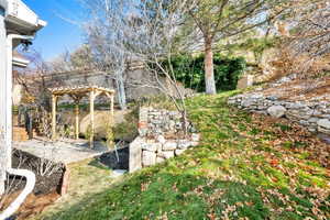 View of yard with a pergola