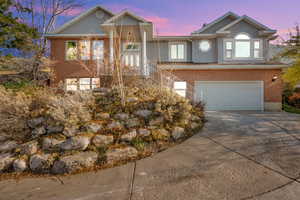 View of front of home featuring a garage