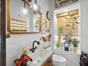 Bathroom with vanity and toilet