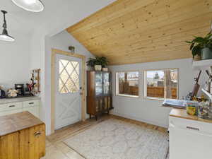 More cabinet space for kitchen and door to back yard