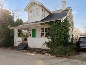 View of front of property with four parking places next door to the north