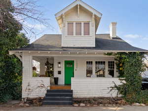 View of front of house featuring covered porch