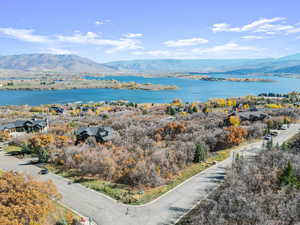 Exterior space featuring a water and mountain view