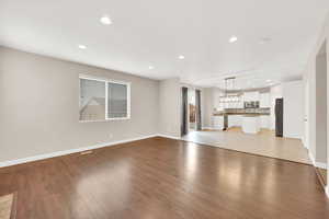 Unfurnished living room featuring light hardwood / wood-style flooring