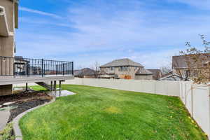 View of yard featuring a deck