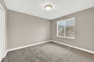 View of carpeted spare room