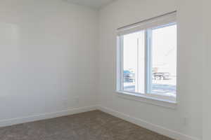 Empty room featuring carpet