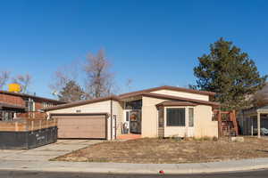 View of front of home with a garage