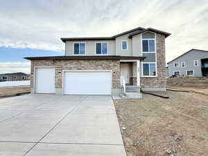 Front of property featuring a garage