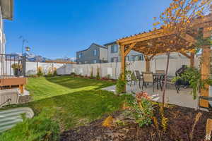 View of yard featuring a mountain view and a pergola