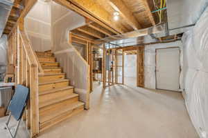 Basement featuring water heater