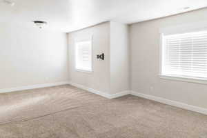 Spare room with carpet floors