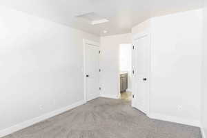 View of carpeted spare room