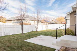 View of yard with a patio