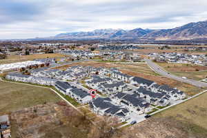 Birds eye view of property with a mountain view