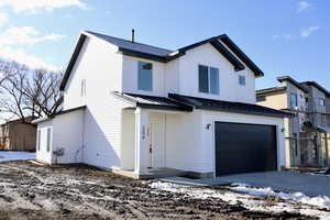 View of front facade with a garage