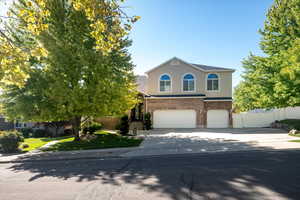 View of property featuring a garage