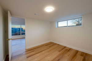 Spare room featuring light hardwood / wood-style flooring