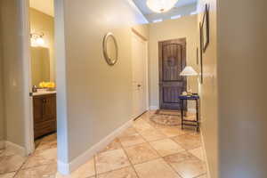 Foyer entrance & guest bath off entry