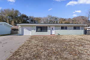 Ranch-style house with a garage