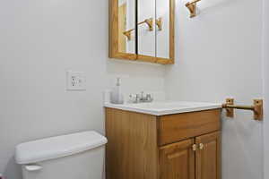 Bathroom with vanity and toilet