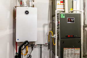 Utilities with tankless water heater