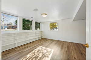 Spare room featuring light hardwood / wood-style flooring