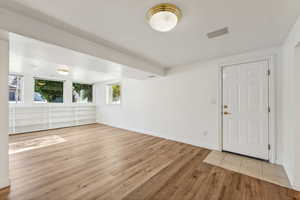 Foyer featuring light hardwood / wood-style flooring