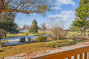 View of yard with a water view