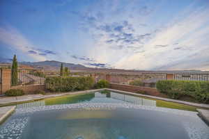 View of pool featuring a mountain view