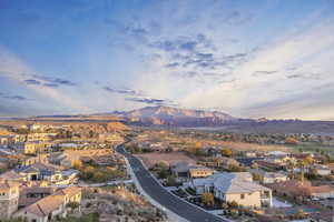 Aerial view at dusk featuring a mountain view