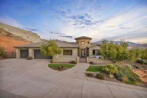 View of front of property with a garage