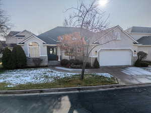 View of front of property featuring a garage