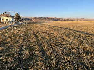 View of yard featuring a mountain view and a rural view