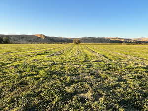 Property view of mountains featuring a rural view