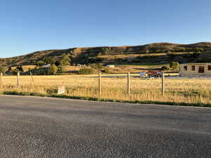 Property view of mountains with a rural view