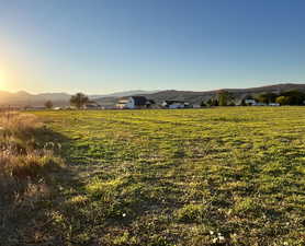 Property view of mountains featuring a rural view