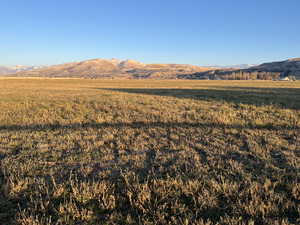 Property view of mountains featuring a rural view