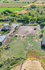 Birds eye view of property featuring a rural view