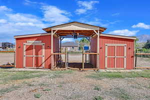 View of outbuilding featuring a mountain view