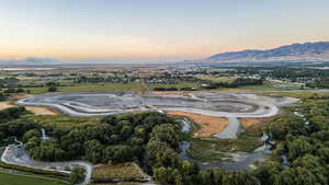 Aerial view at dusk featuring a mountain view