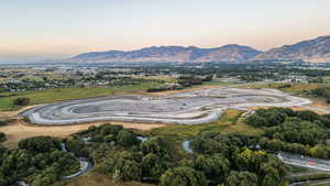 Aerial view at dusk featuring a mountain view