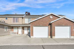 View of front of property featuring a garage